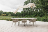 SLIDER-JOLI_table-Curve-elyps-travertino-grey_Fizz-lino.jpg Table céramique design CURVE JOLI ovale